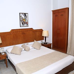 Standard Triple Room Partial Sea Garden View
